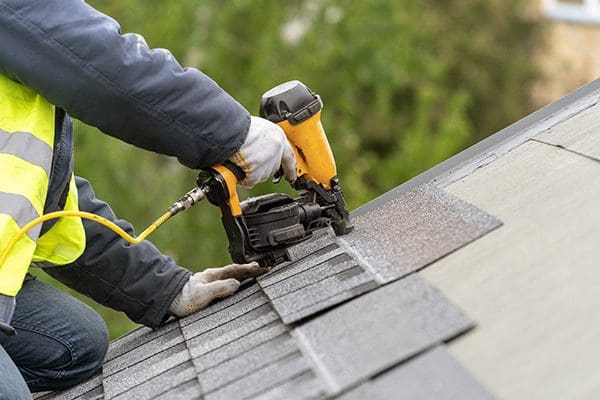 Installing Roof with Nail Gun